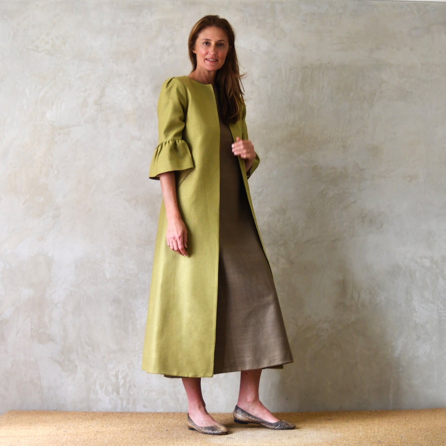 Bespoke British-made Bell Sleeve A-Line Coat in Silk Matka. Summer Weight Silk Coat with Sleeve Detail – Perfect for Formal Occasions and wearable even on the hottest of days. Handmade in Britain.