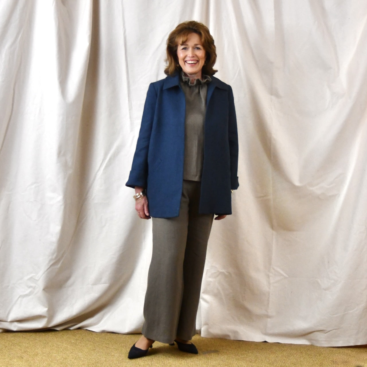Navy Swing Jacket in Irish Linen. Easy and elegant jacket with cuff detail, slant pockets and a wide neck. Handmade in Britain. Over Trousers.