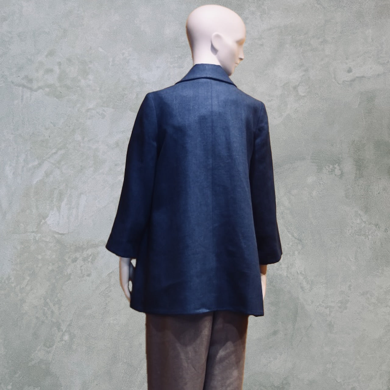 Swing Jacket in Navy Irish Linen with fossil brown linen pants. Back View. Made by Hand in Great Britain.