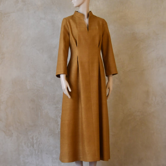 Tan coloured Waisted longer length formal mid-season tailored dress. Ready to Ship and Made to order. Sizes 6 to 20 and bespoke. Made by hand in East London.