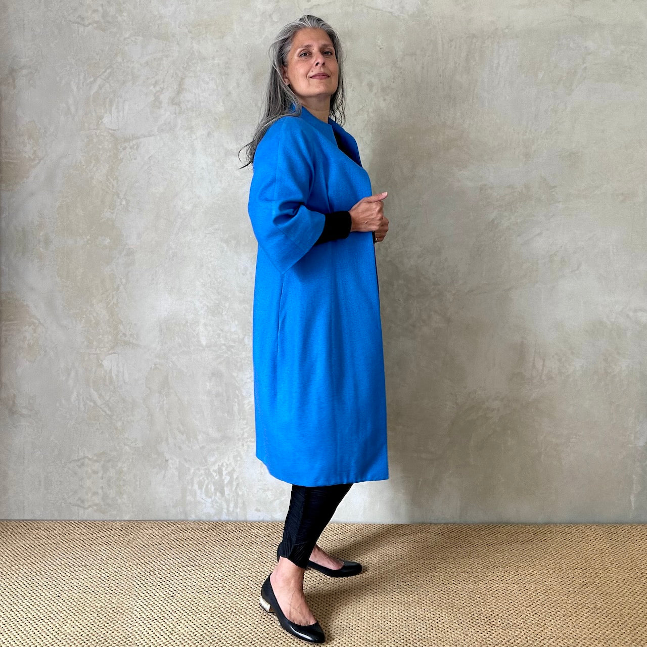A summer-weight Silk Matka Cocoon Coat in bright blue. Elegant and easy. Handmade in Britain.