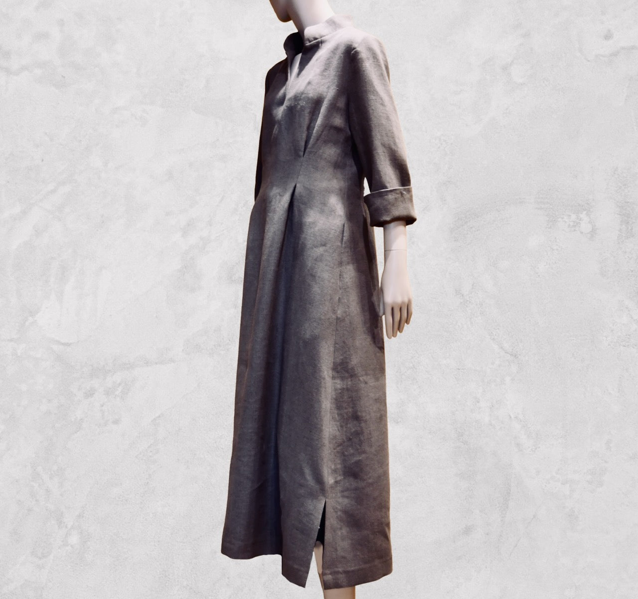 Bespoke Waisted Linen Dress with Nehru Collar and V-Neck Front, Darted pleats to the front and three Quarter Length Sleeves.
Pure Irish Linen.
Handmade in London
Entirely Made in the British Isles.