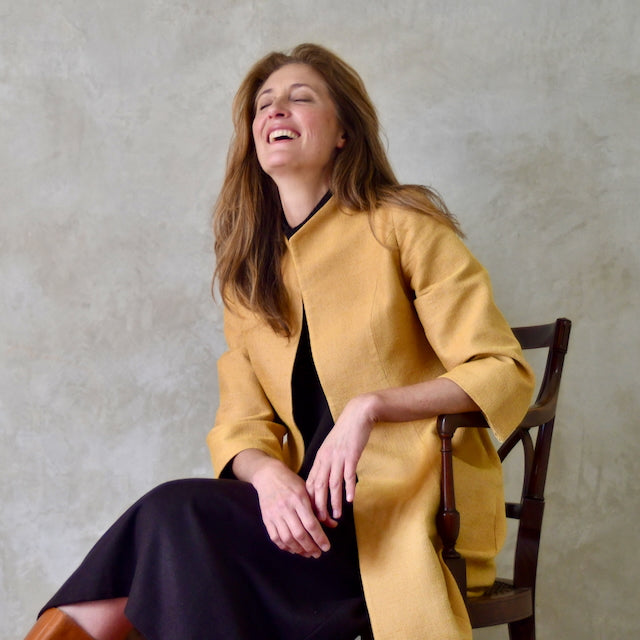 Yellow Trapeze Coat Sitting