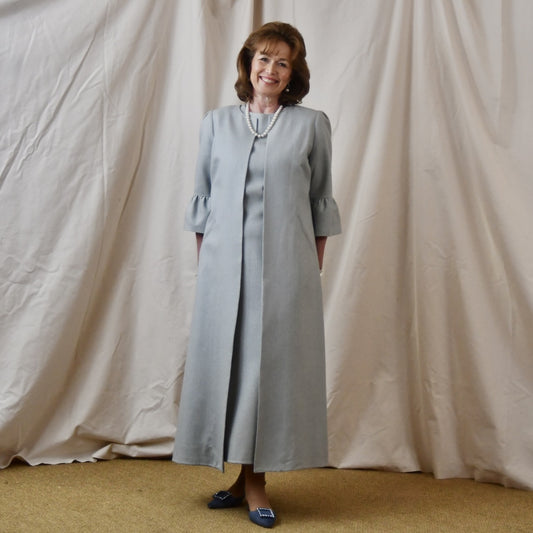 Bespoke Bell Sleeve A Line Occasion Coat in Pale Blue Silk Matka. Fully lined in Silk. Handmade in Britain. Dress View.