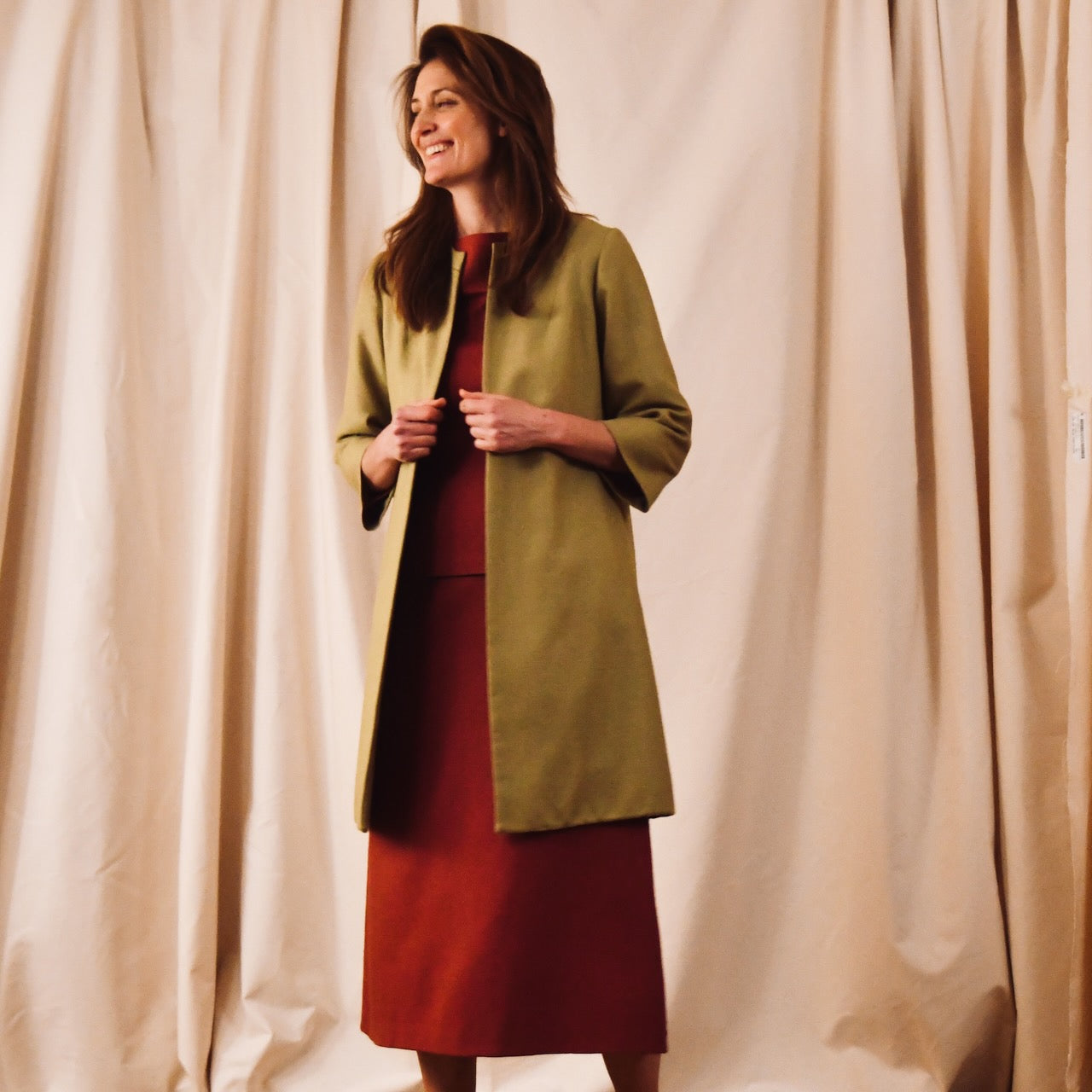 Silk Trapeze Coat - Bespoke Trapeze Coat in Silk Matka. This is a Summer Weight Silk Car Coat style shorter length coat which is available to order in a host of colours. Handmade in Great Britain. Front View over skirt suit.