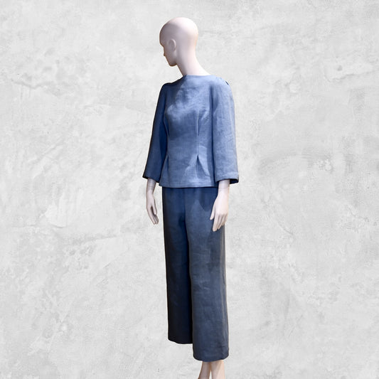 Bespoke Sea Blue Boat Neck Tailored Top with three quarter sleeves in Slubby Irish Linen. Shown worn over matching seafoam linen trousers, full view.
Handmade in Britain.