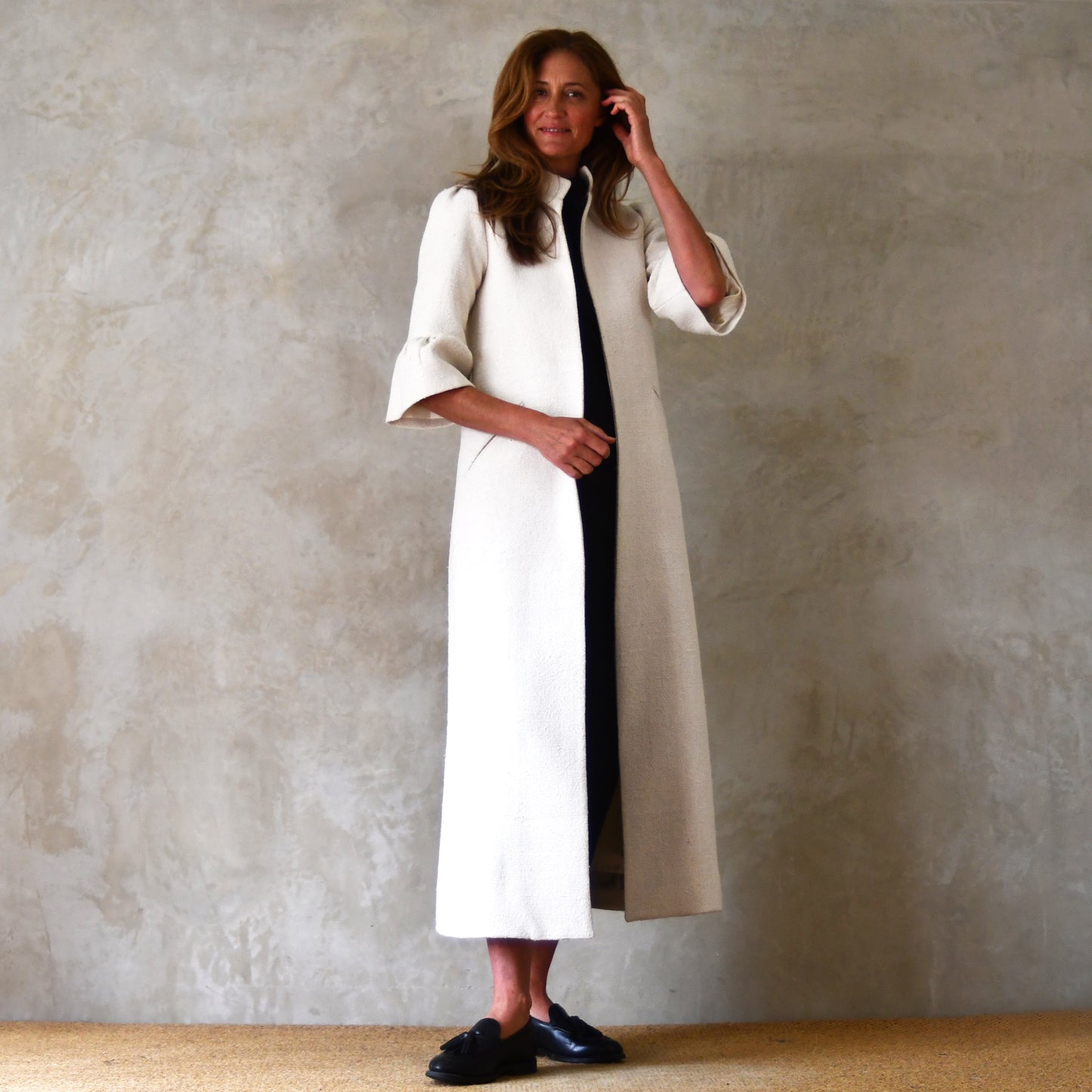 Long White Bell Sleeve Coat. This pure silk boucle is a true investment piece - perfect for white coat lovers and formal occasions. Handmade in Britain. Frill sleeve detail.