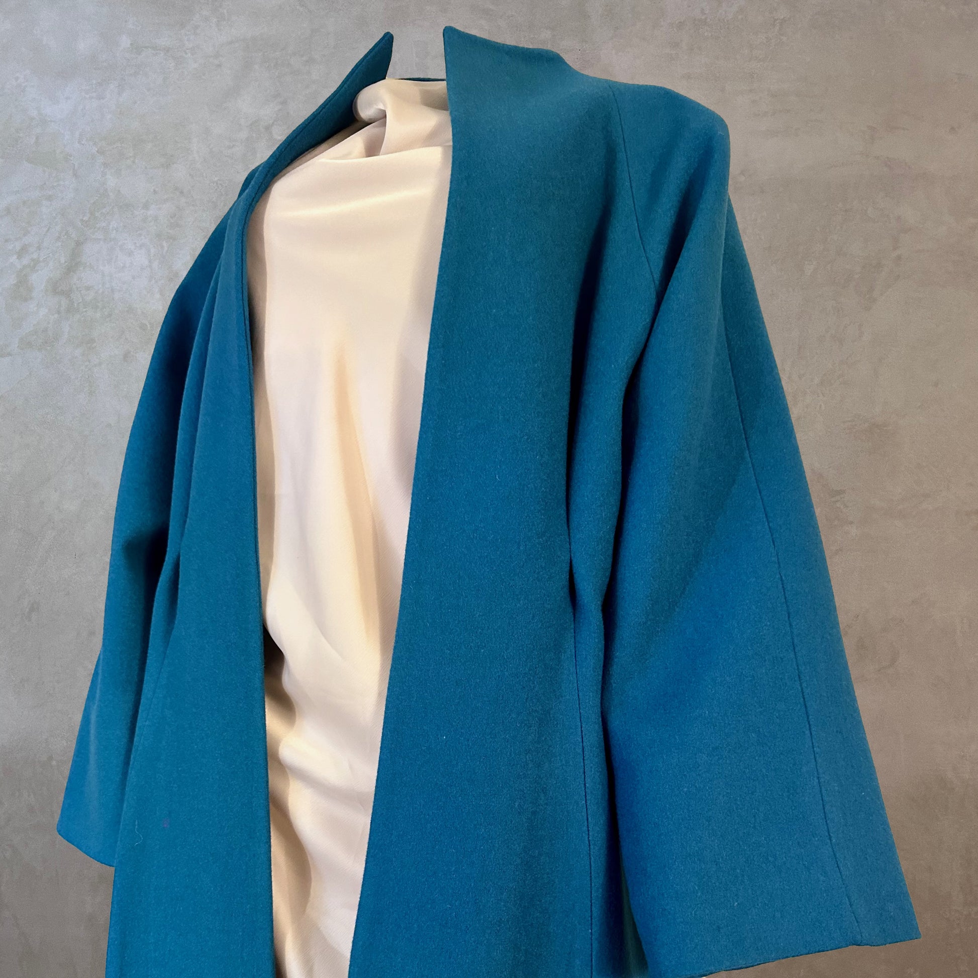 Longer Length Petrol Blue Merino Flannel Cocoon Coat. A shapely and superbly soft investment piece for dressing up or down in Winter. Comfortable, easy and elegant. Handmade in Britain.