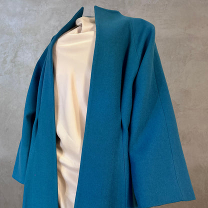 Longer Length Petrol Blue Merino Flannel Cocoon Coat. A shapely and superbly soft investment piece for dressing up or down in Winter. Comfortable, easy and elegant. Handmade in Britain.