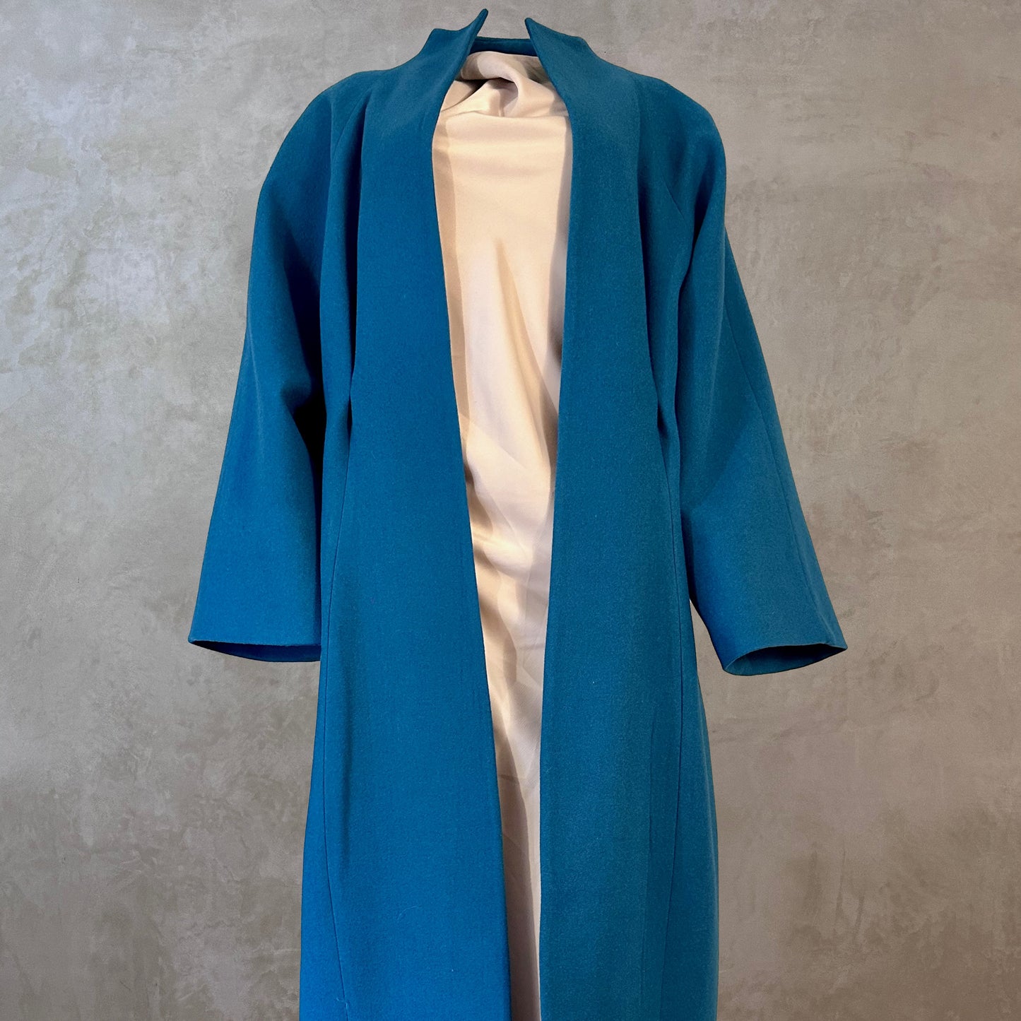 Longer Length Petrol Blue Merino Flannel Cocoon Coat. A shapely and superbly soft investment piece for dressing up or down in Winter. Comfortable, easy and elegant. Handmade in Britain.