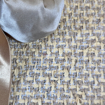 A Tailored Boat Neck Suit in Sand Mix Boucle from Linton Tweeds. Handmade in Britain. Fabric Close Up.