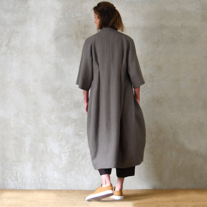 Longer Length Cocoon Coat in Irish Linen.  A slubby, relaxed linen makes for an easy to wear everyday coat that can be dressed up. Handmade in Britain. Rear View.