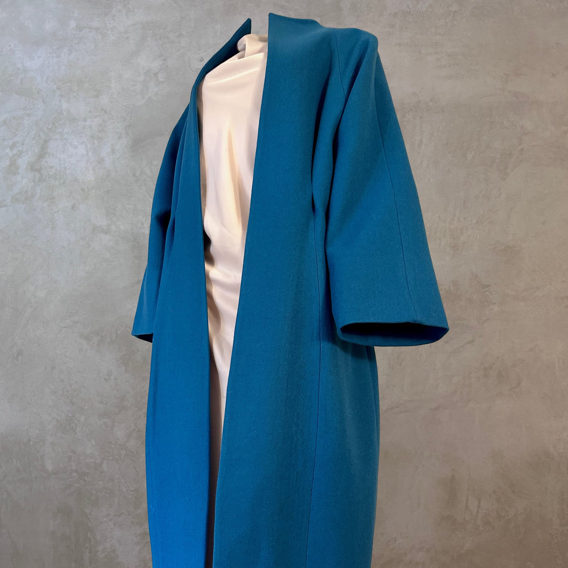 Longer Length Petrol Blue Merino Flannel Cocoon Coat. A shapely and superbly soft investment piece for dressing up or down in Winter. Comfortable, easy and elegant. Handmade in Britain.
