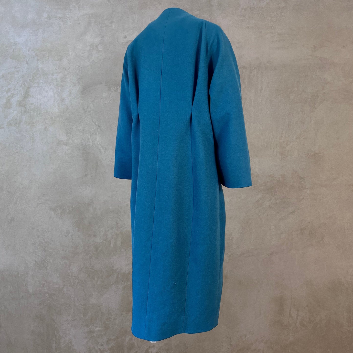 Longer Length Petrol Blue Merino Flannel Cocoon Coat. A shapely and superbly soft investment piece for dressing up or down in Winter. Comfortable, easy and elegant. Handmade in Britain. Rear View.