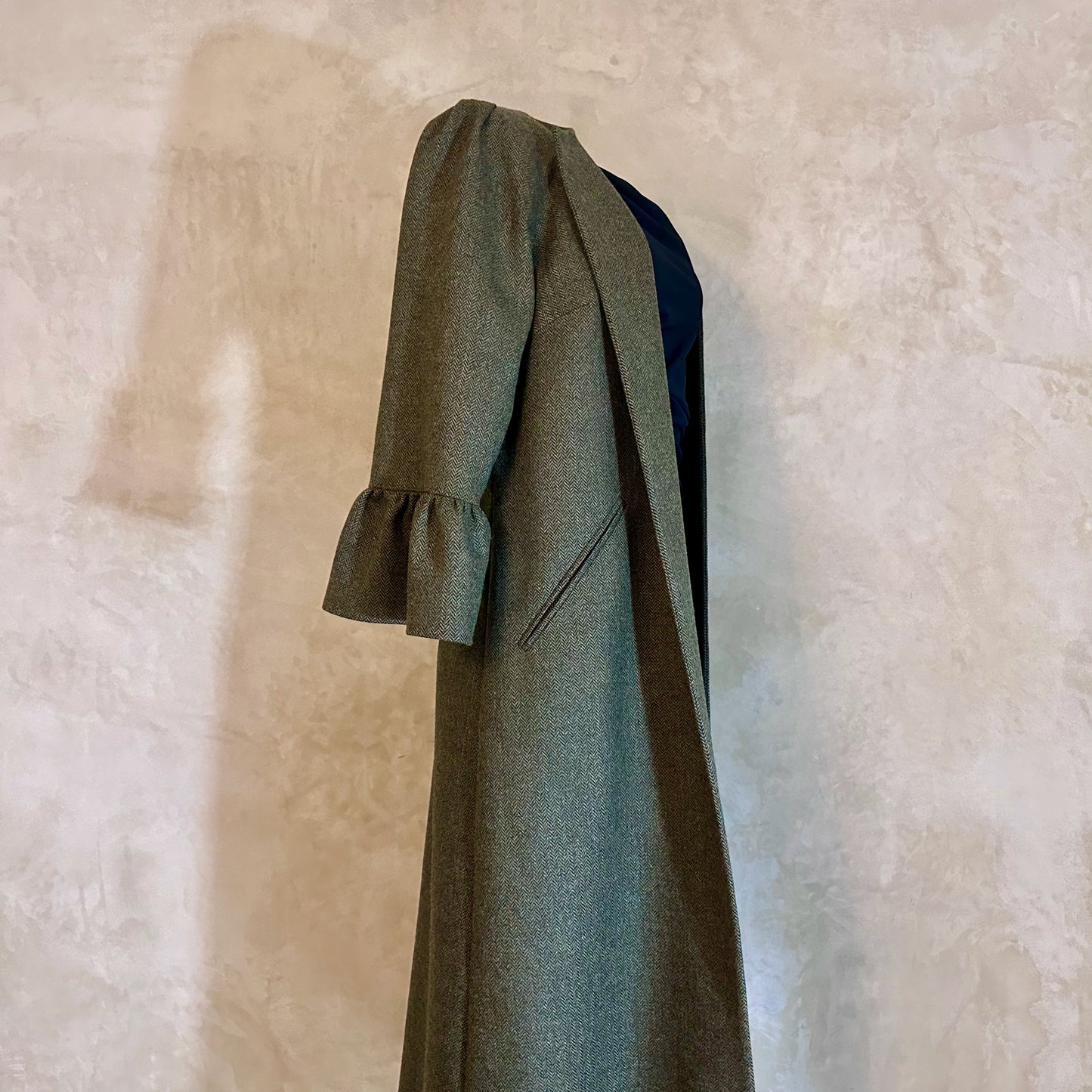 the brett coat in deep sage green lambswool herringbone tweed image 0