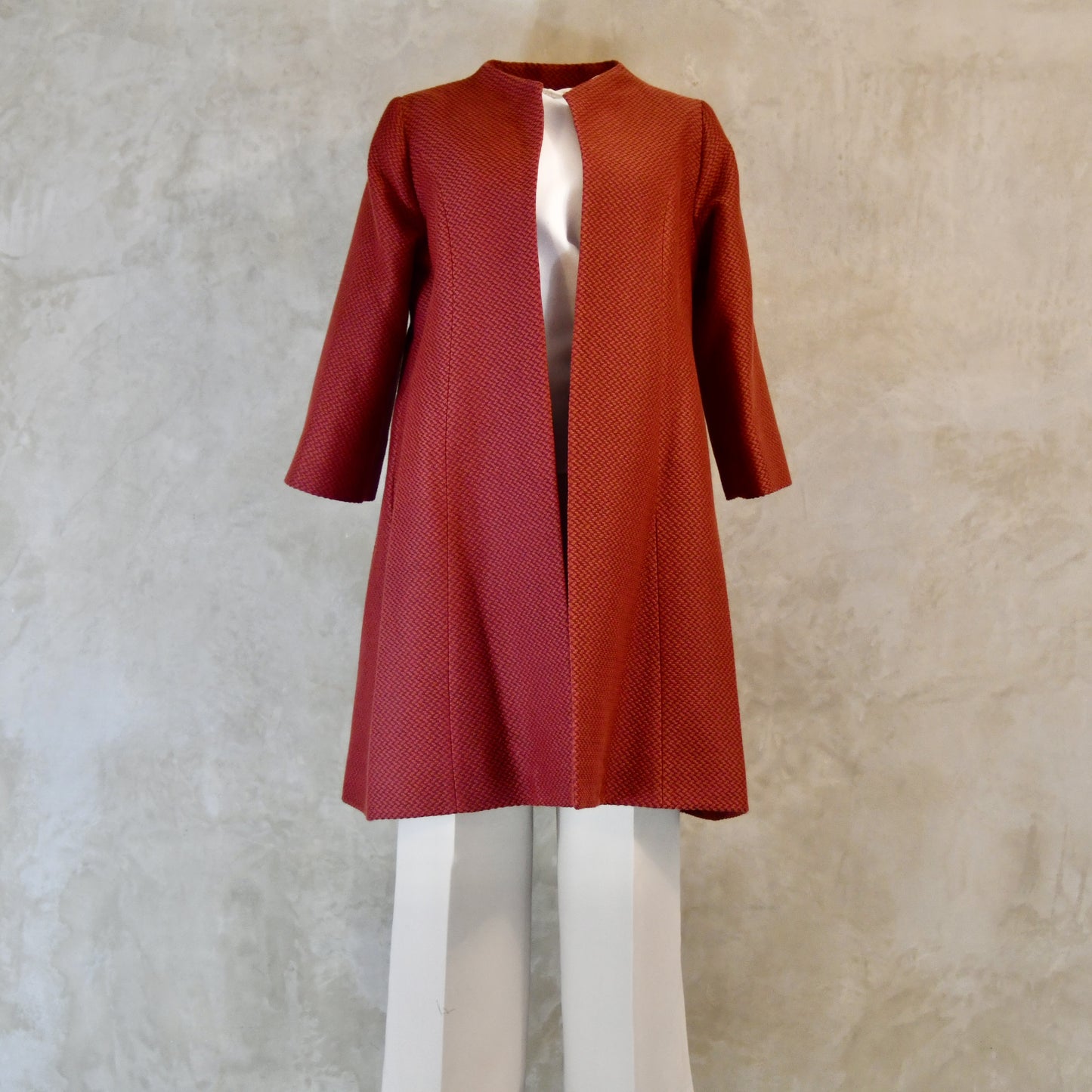 Trapeze Swing Coat in Limited Edition Rust Corn Brocade. A bespoke  Elegant Spring or Work MidLength Swing Coat with slight vintage feel and flattering seaming details to front and rear. Entirely made in Great Britain. Front View.