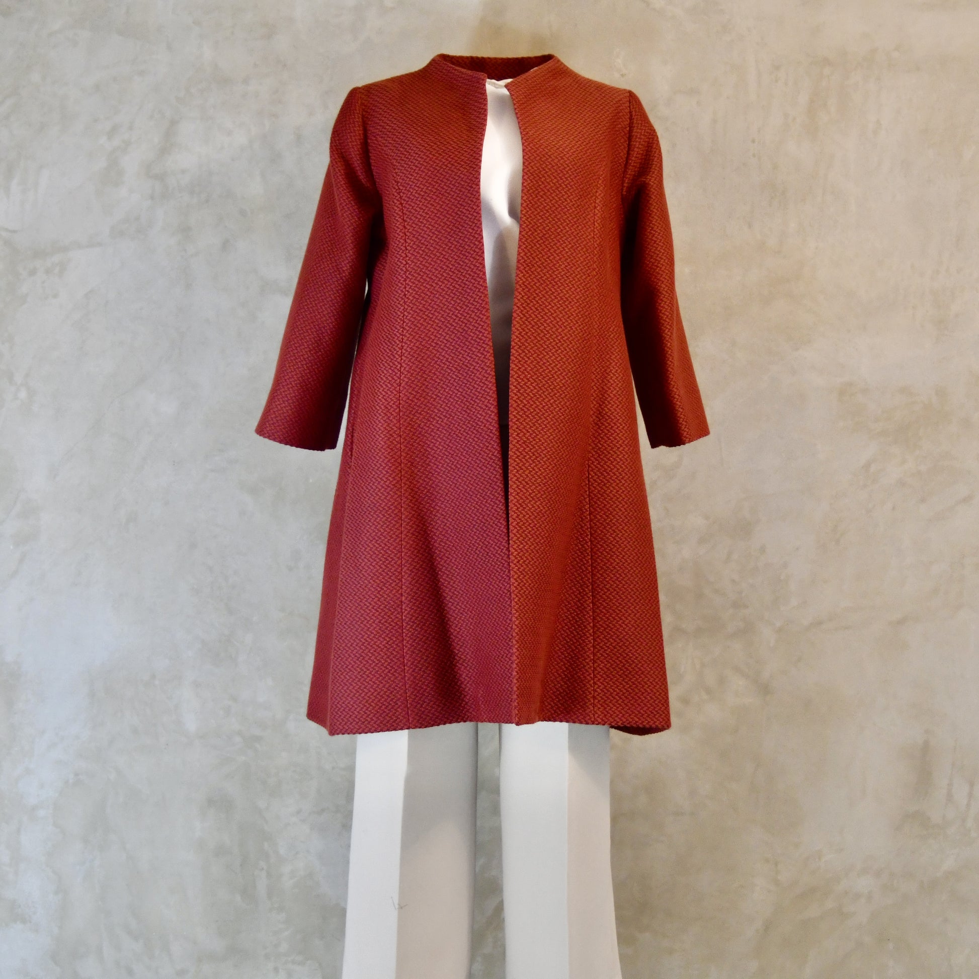 Trapeze Swing Coat in Limited Edition Rust Corn Brocade. A bespoke  Elegant Spring or Work MidLength Swing Coat with slight vintage feel and flattering seaming details to front and rear. Entirely made in Great Britain. Front View.