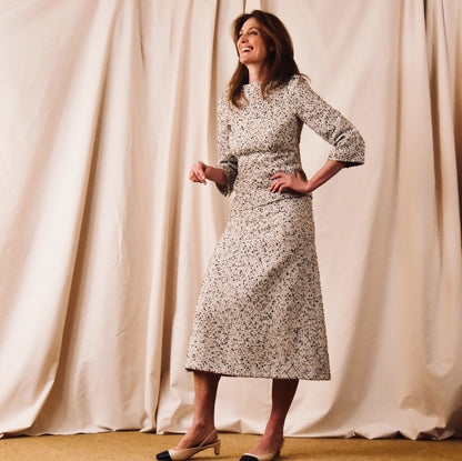 A tailored skirt suit in a light coloured Linton Tweeds bouclé – perfect for Royal Ascot and other formal occasions in spring and summer. Handmade in Britain. Full View.