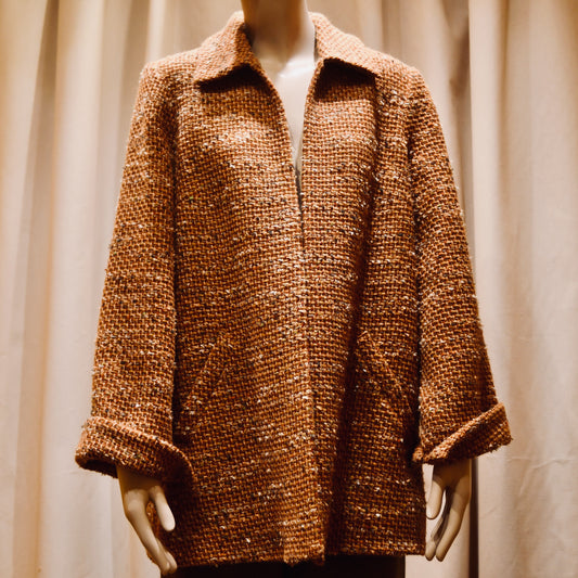 Tailored Swing Jacket in Burnt Orange Wool Mix Bouclé from Linton Tweeds. A women’s long-sleeve, collared coat with slanted front pockets. Sophisticated and easy. Handmade in Britain.