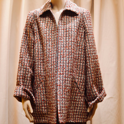 Tailored Swing Jacket in in Red, Ecru and Navy Wool Bouclé from Linton Tweeds. This bespoke jacket has rolled cuffs, a textured finish and a flared silhouette. Shown from front. Handmade in Britain.