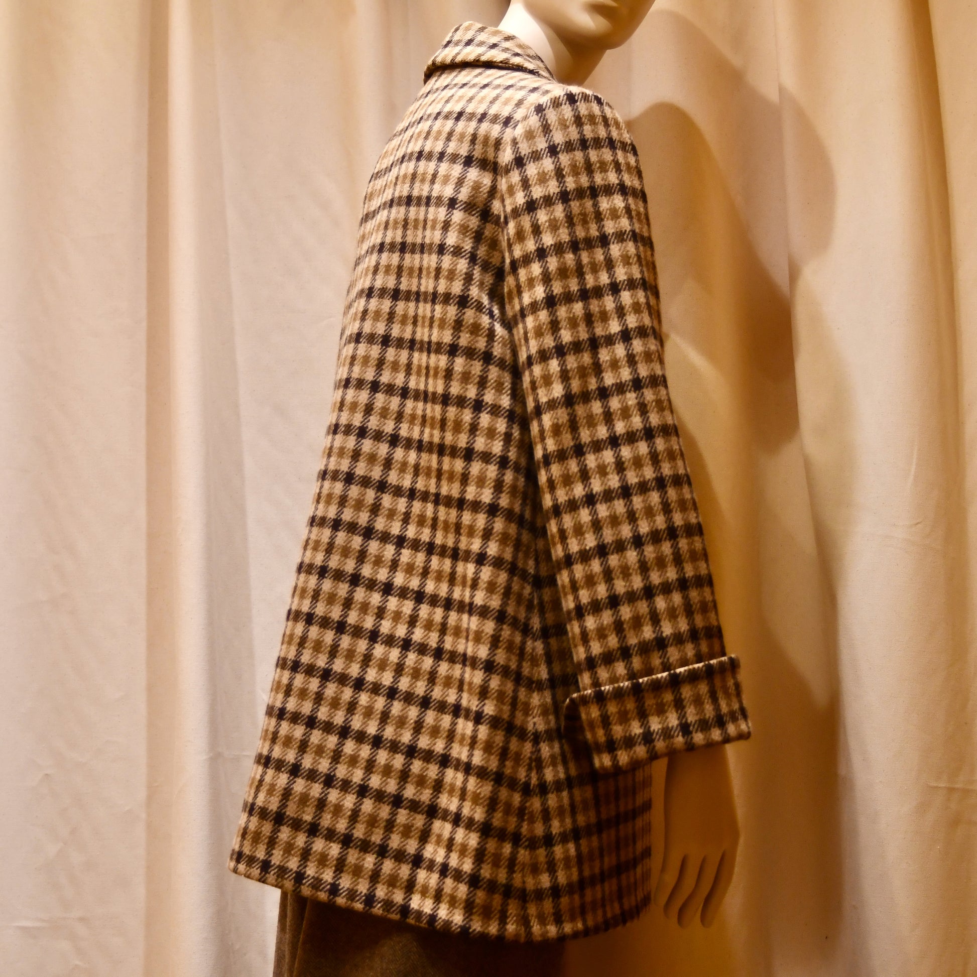 Swing Jacket in Gunclub Check Merino Flannel, featuring long sleeves and a collar. Flannel from Fox Brothers. Handmade in Great Britain.