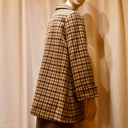 Swing Jacket in Gunclub Check Merino Flannel, featuring long sleeves and a collar. Flannel from Fox Brothers. Handmade in Great Britain.