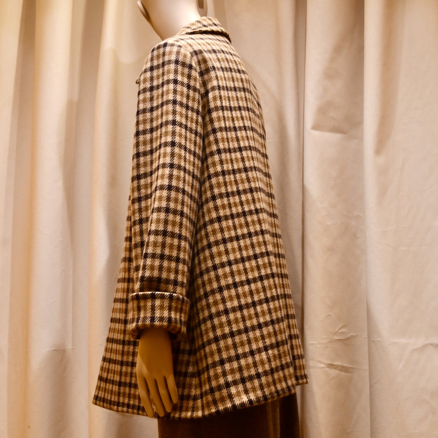 Swing Jacket in Fox Flannel Gunclub Check, featuring brown and cream checks with long sleeves. Handmade in Britain.