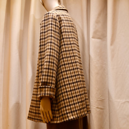 Swing Jacket in Fox Flannel Gunclub Check, featuring brown and cream checks with long sleeves. Handmade in Britain.