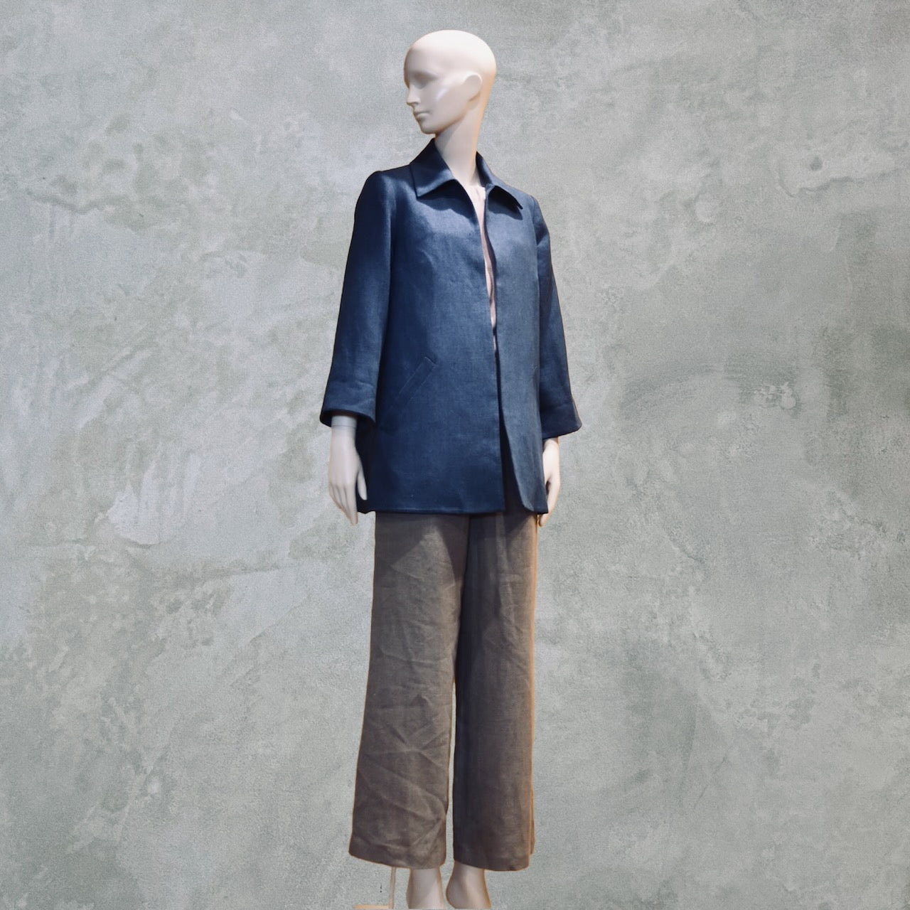 Navy Swing Jacket in Irish Linen. Easy and elegant jacket with cuff detail, slant pockets and a wide neck. Handmade in Britain.