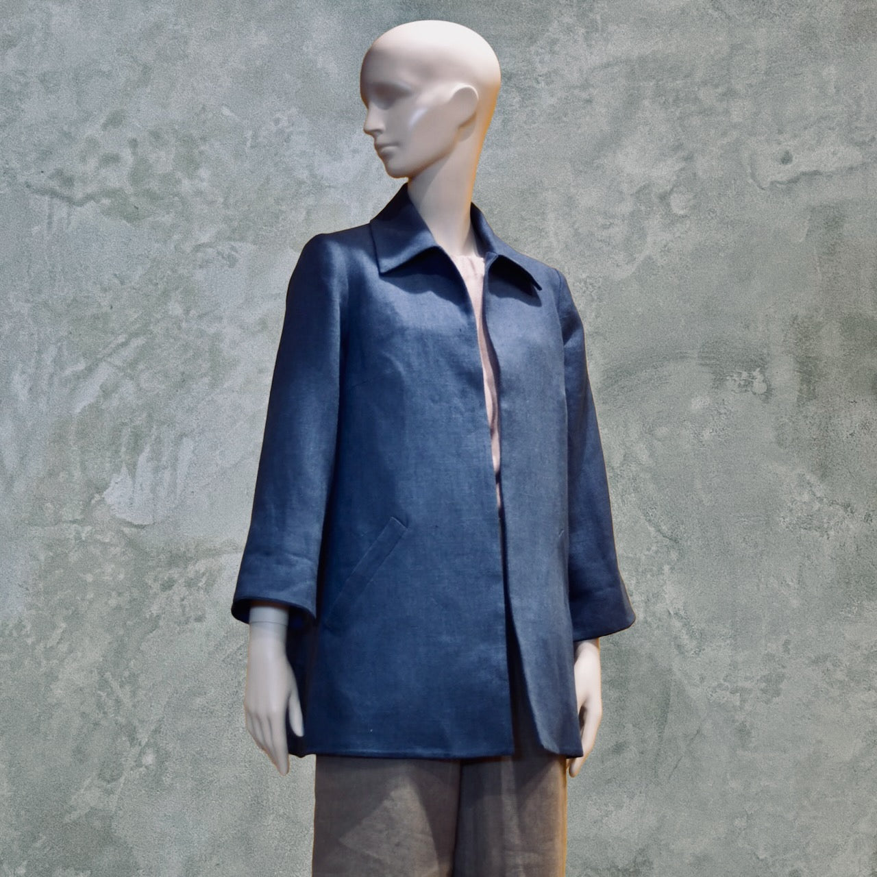 Navy Swing Jacket in Irish Linen. Easy and elegant jacket with cuff detail, slant pockets and a wide neck. Handmade in Britain.