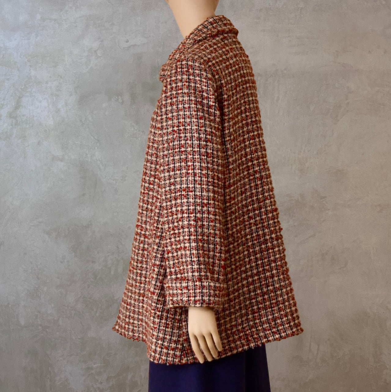 Swing Jacket in  red, ecru, and navy Wool Mix Bouclé from Linton Tweeds. Featuring a collar and turn up sleeve cuffs. Handmade in Britain. 