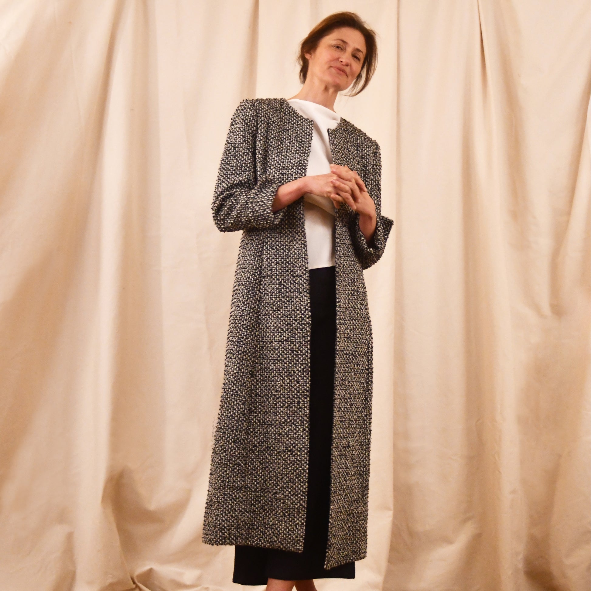 Fitted Longline Hourglass Coat in Linton Tweeds Black and White Boucle. An investment piece for Ascot, Weddings and Work. Handmade in Britain.