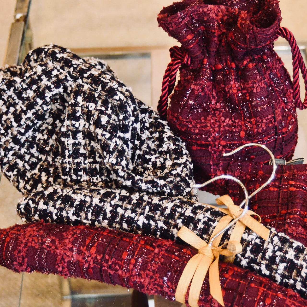 Linton Tweeds Cut offs from EdNerat repurposed into bucket and clutch bags and padded hangers. Perfect for Christmas presents. Handmade in Abergavenny.