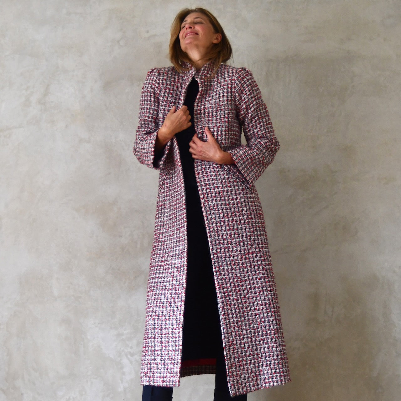 An Ednerat A-Line Coat in Red and Ecru and Navy Wool Bouclé from Linton Tweeds.  Handmade in Britain. 