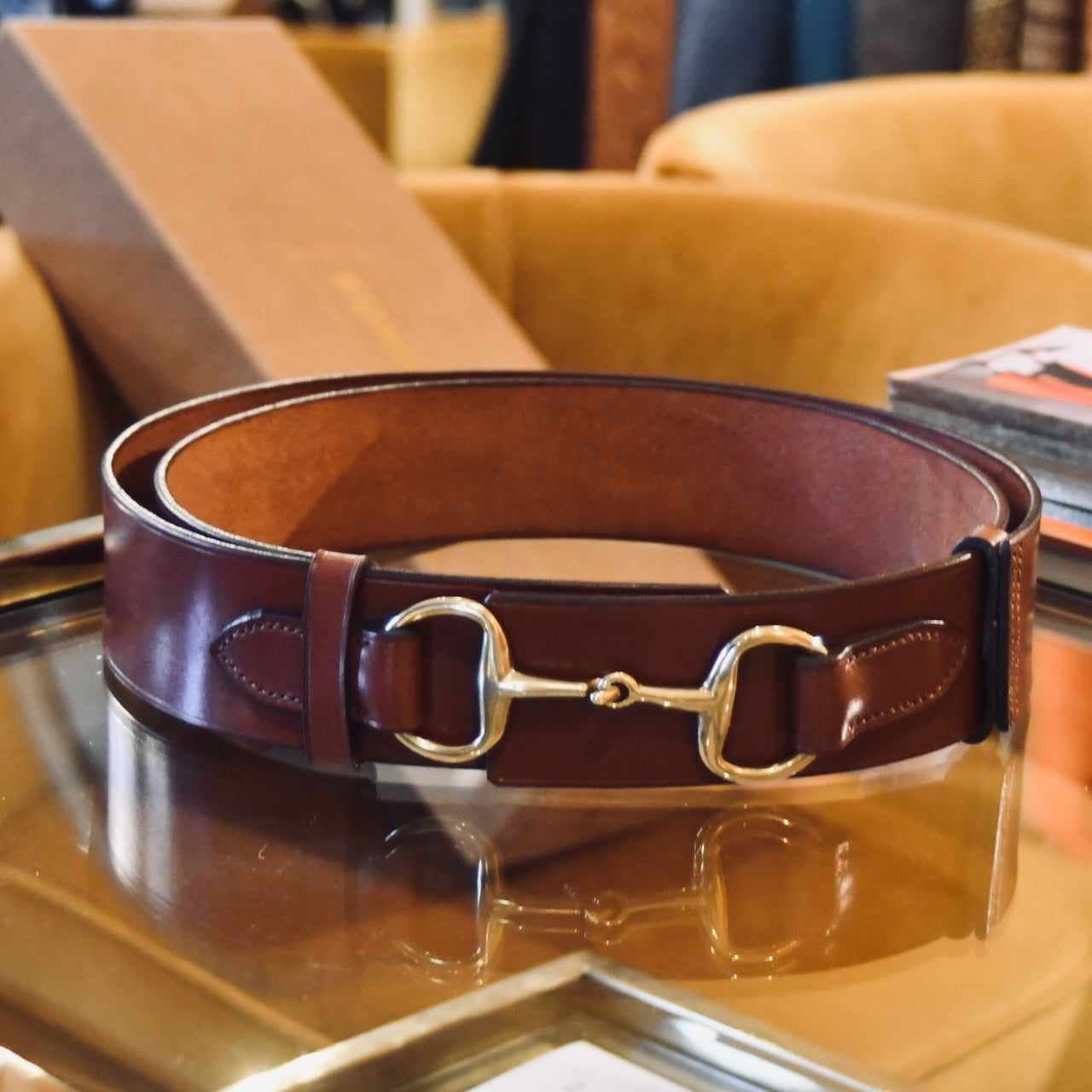 The EDNERAT Hazel Adjustable Bit Belt 95-110 cm, crafted from leather with a brass horse bit buckle and solid brass fittings. Handmade in Britain.