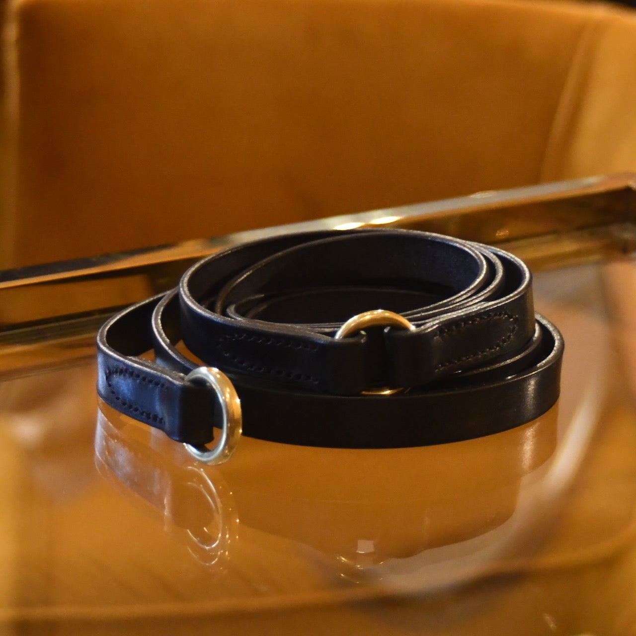 The EDNERAT Black Double Wrap Belt - 200cm, crafted from premium British saddle leather and finished with a brass buckle. Handmade in Britain.