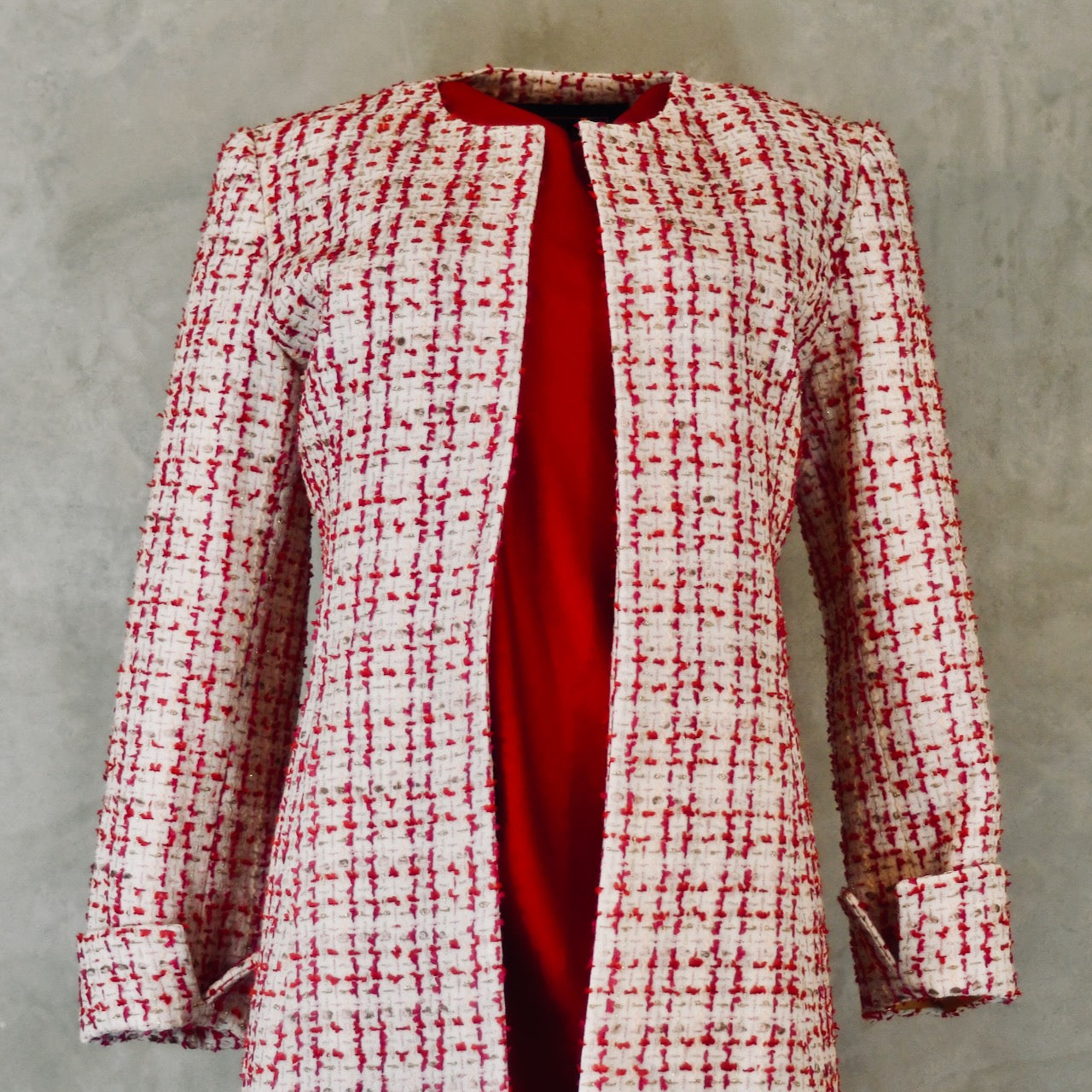 Fitted Hourglass Coat in Pink Linton Tweeds Boucle. A Summer Bouclé Coat perfect for Royal Ascot and Summer Occasions. An investment piece handmade in Britain. Top View