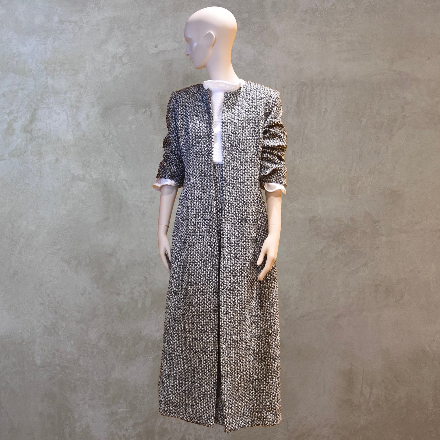 Fitted Longline Hourglass Coat in Linton Tweeds Black and White Boucle. An investment piece for Ascot, Weddings and Work. Handmade in Britain. With Skirt