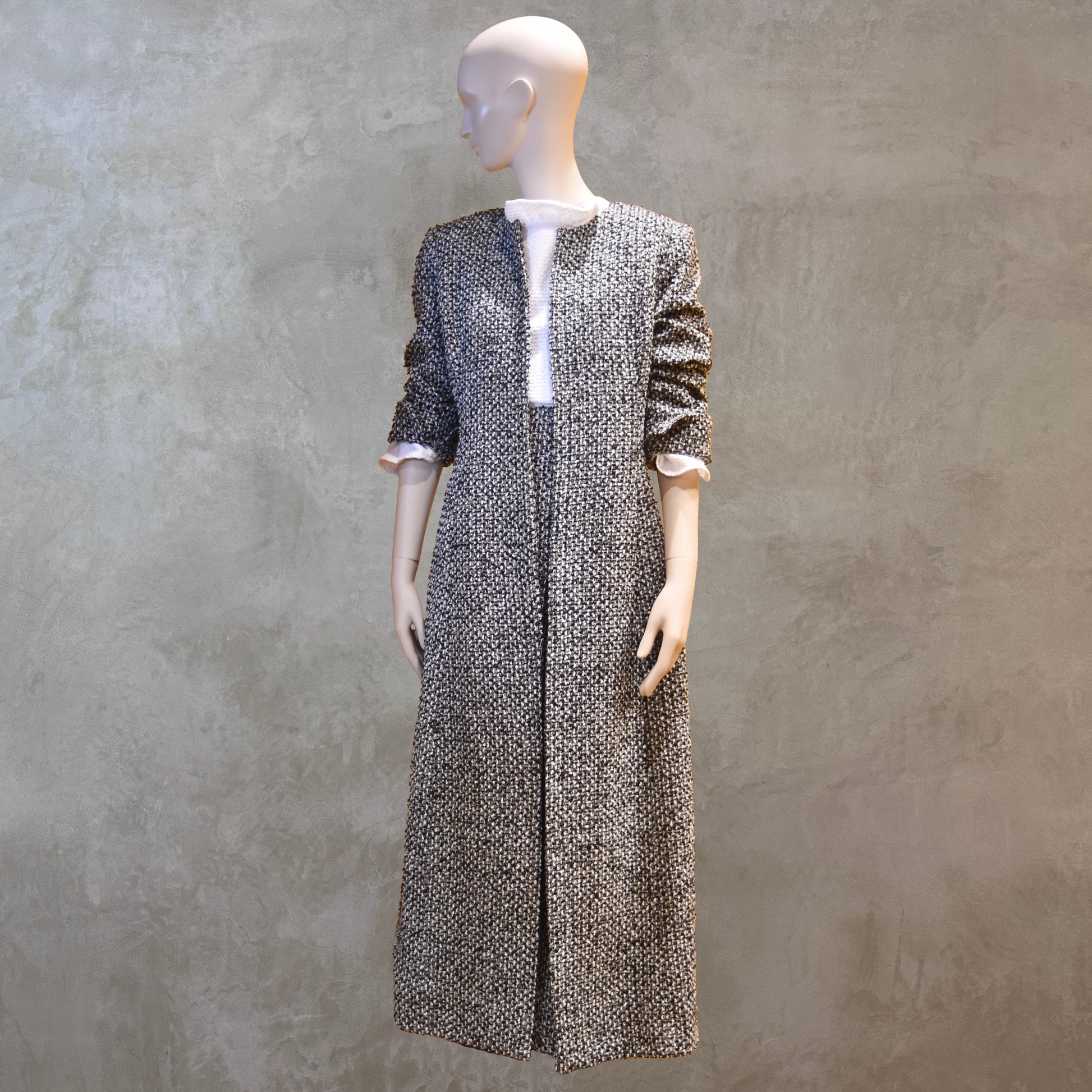 Fitted Longline Hourglass Coat in Linton Tweeds Black and White Boucle. An investment piece for Ascot, Weddings and Work. Handmade in Britain. With Skirt