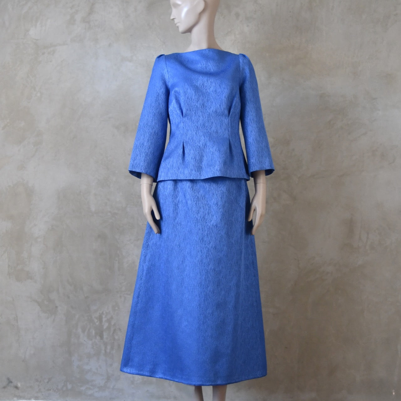 The Tailored Boat Neck Skirt Suit in Blue Brocade