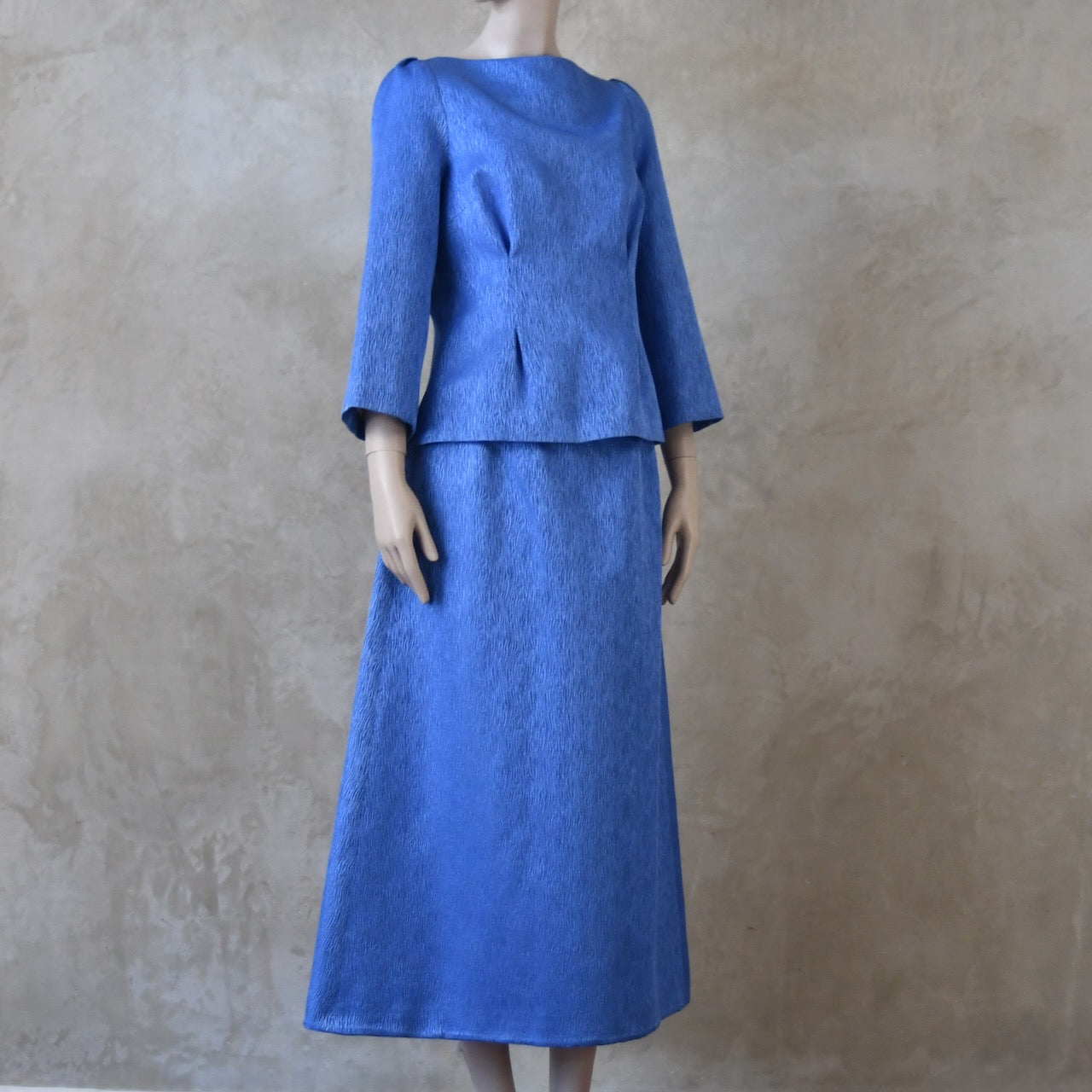 The Tailored Boat Neck Skirt Suit in Blue Brocade