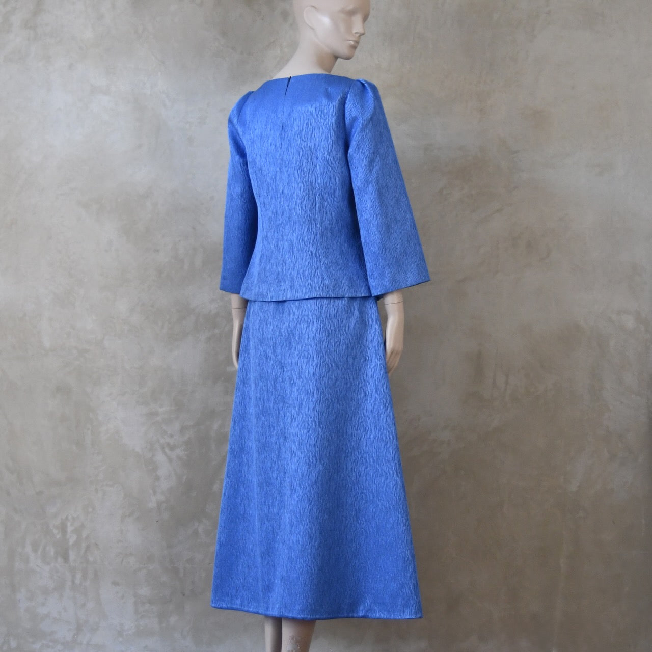 The Tailored Boat Neck Skirt Suit in Blue Brocade