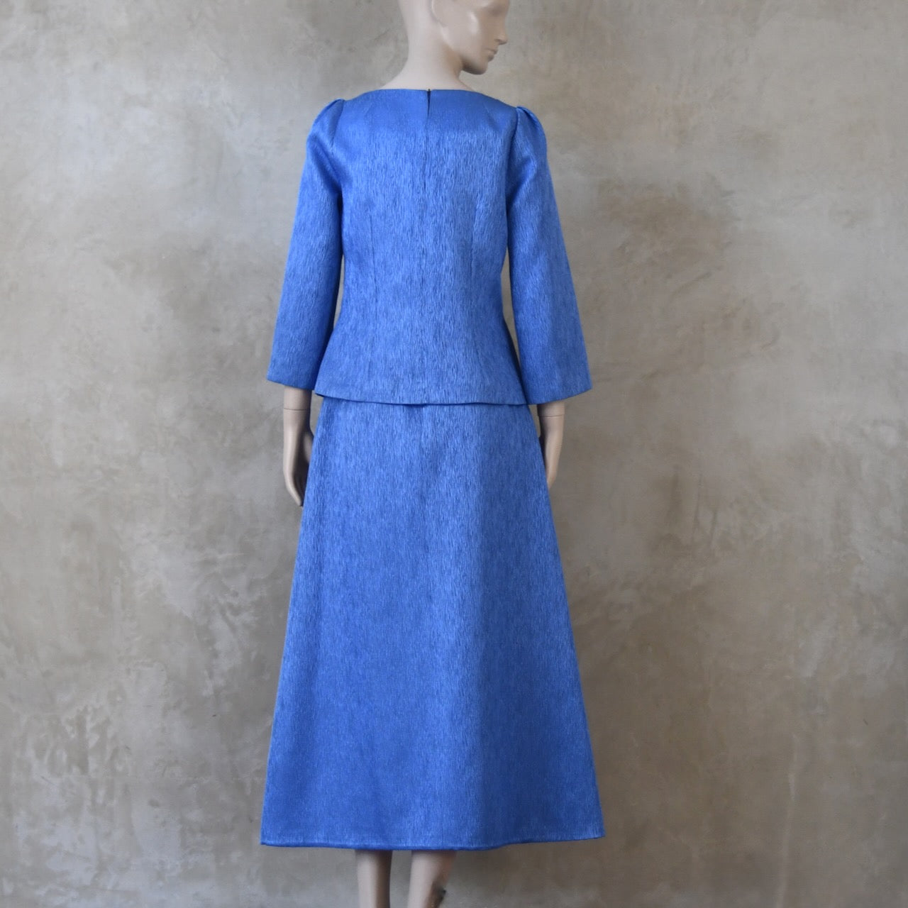 The Tailored Boat Neck Skirt Suit in Blue Brocade