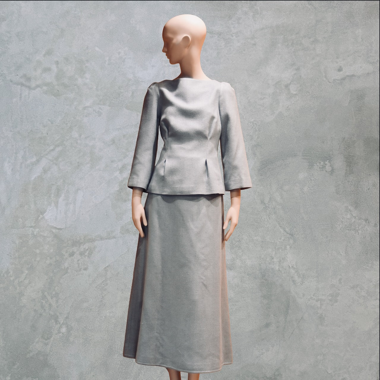 Bespoke Tailored Silk Linen separates featuring a Tailored Boat Neck Blouse in blue silk with matching skirt. Handmade in Britain.
