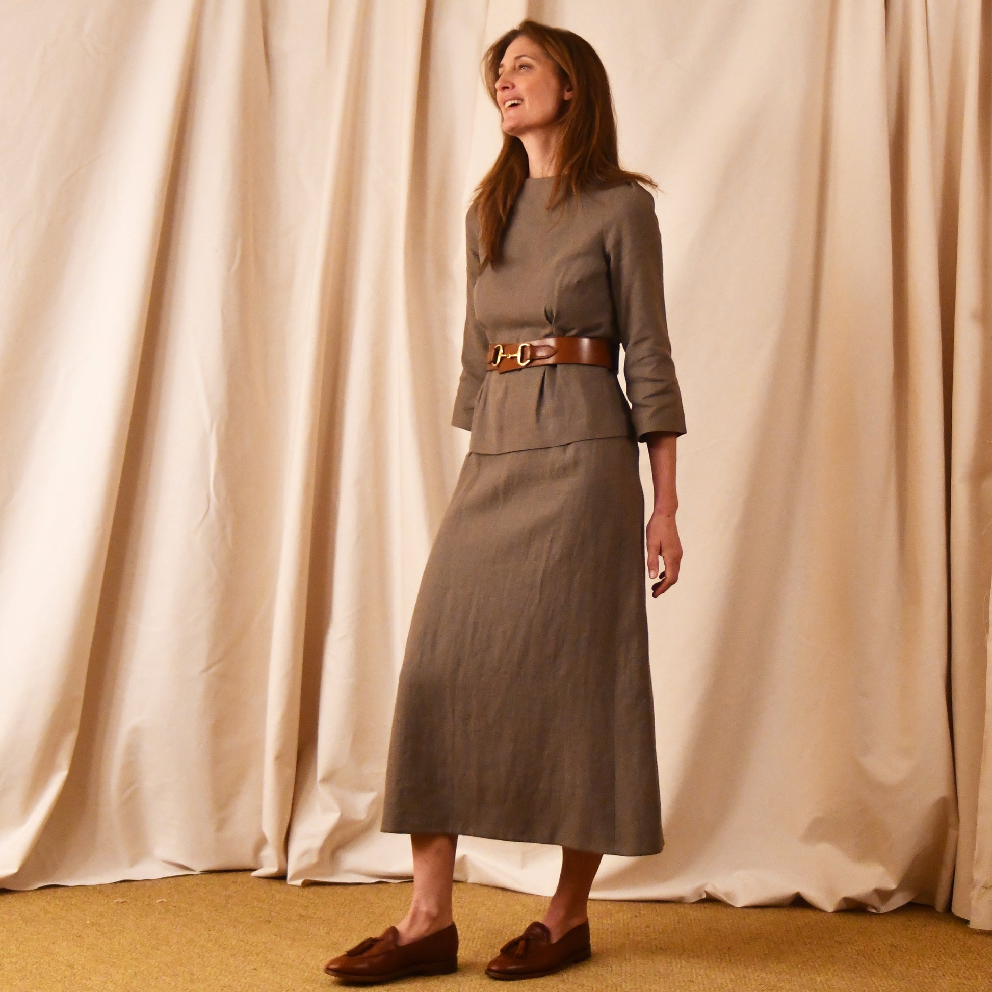 Bespoke British Made Separates. A Tailored Boat Neck Blouse in Brown Irish Linen. Fitted and elegant the top is shown over a matching A-Line skirt. Handmade in Britain.