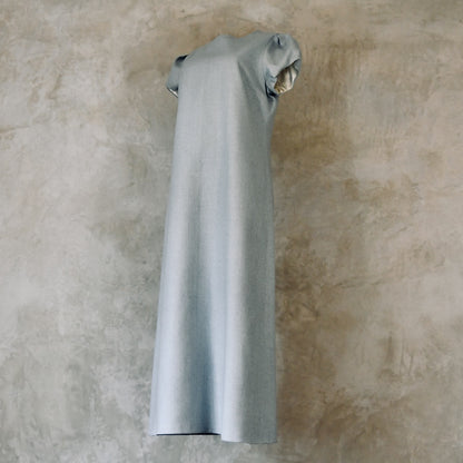 An A-Line Bell Sleeve Coat and Dress in Light Blue Silk Matka. A long, short-sleeved blue woven dress with an A-Line cut. Handmade in Britain. Dress Side View.