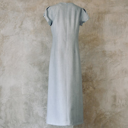 An A-Line Bell Sleeve Coat and Dress in Light Blue Silk Matka. A long, short-sleeved blue woven dress with an A-Line cut. Handmade in Britain. Dress Back View.