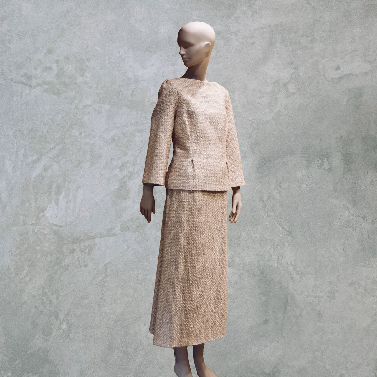 A Tailored Boat Neck Suit in Sand Mix Boucle from Linton Tweeds. Handmade in Britain.
