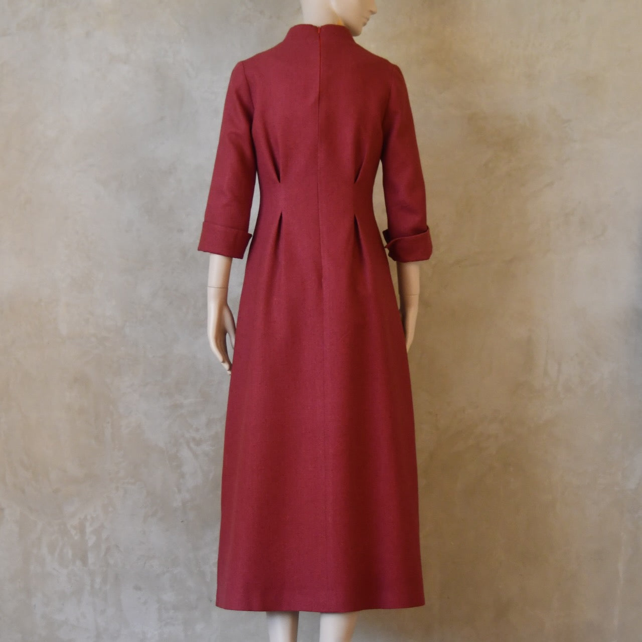Back view of Dark Pink Silk Waisted longer length mid-season tailored dress. Ready to Ship and Made to order. Sizes 6 to 20 and bespoke. Made by hand in East London.
