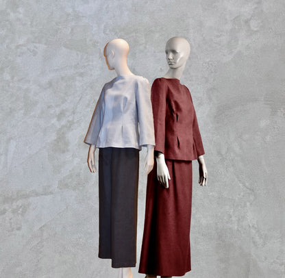 A Tailored Boat Neck Skirt Suit in Damson Silk Matka, featuring a loose top and matching A-Line skirt. Handmade in Britain. 